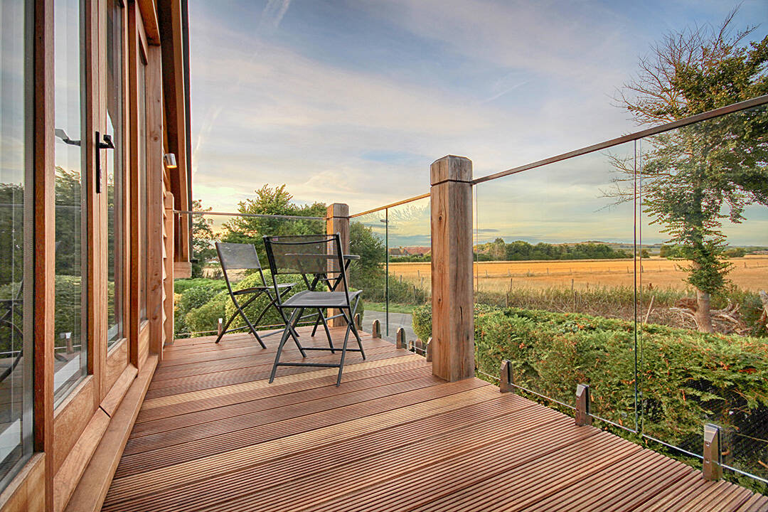 Oak balcony on a room above carport