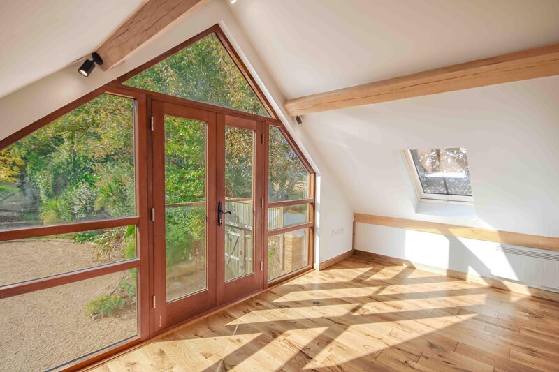Glazed Balcony In Room Above Garage